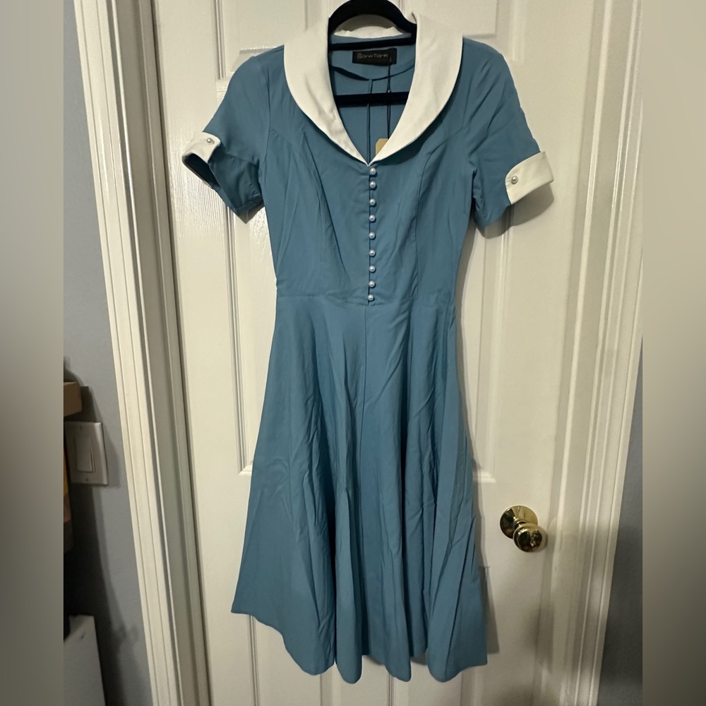 Vintage style swing dress with button details
